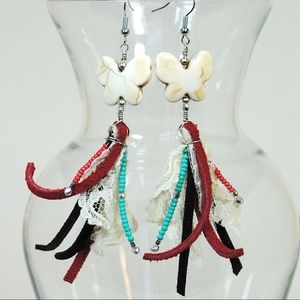 White butterfly dangle earrings